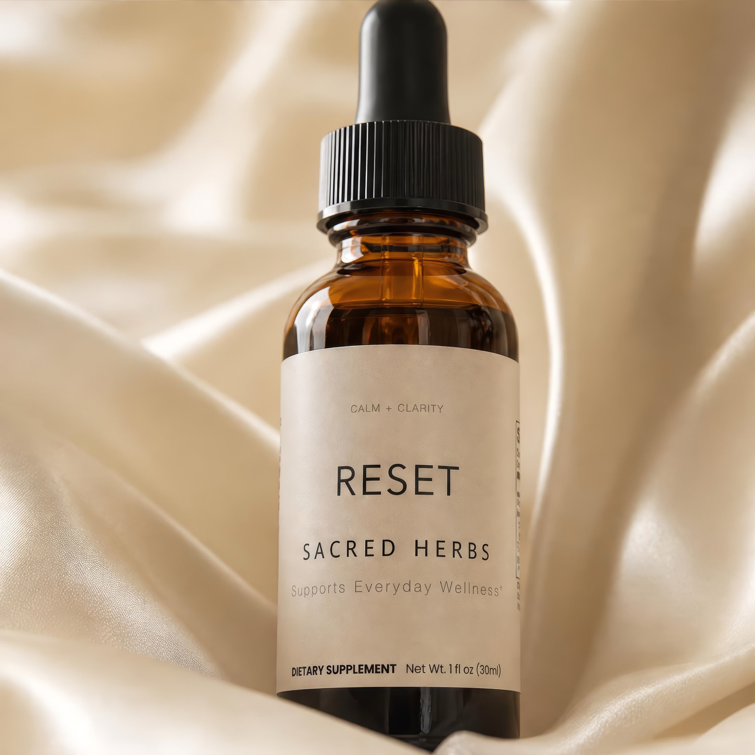 RESET bottle on silk fabric